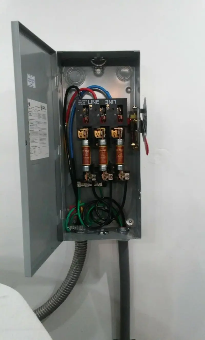 Three-phase disconnect switch installed for Smoke Detector Installation in Middle